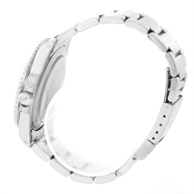 This is a Rolex GMT-Master 16710 Men's Stainless Steel Black Dial 16710 Men's Stainless Steel Black Dial watch shown from a side angle, displaying the case, crown, and part of the metal bracelet.