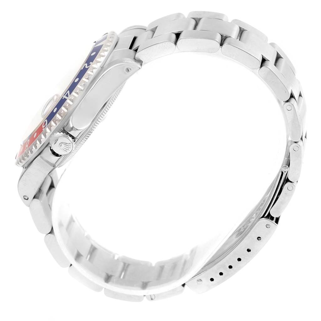 This side-angle view showcases the case, crown, and bracelet of the Rolex GMT-Master 16710 Men's Stainless Steel Black Dial 16710 Men's Stainless Steel Black Dial watch.