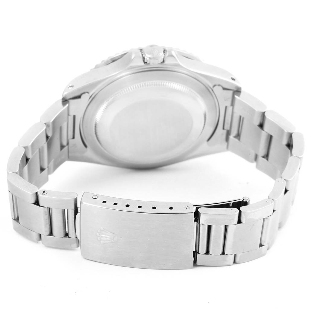 The image shows the back view of a Rolex GMT-Master 16710 Men's Stainless Steel Black Dial 16710 Men's Stainless Steel Black Dial watch, highlighting its case, crown, bracelet, and clasp.