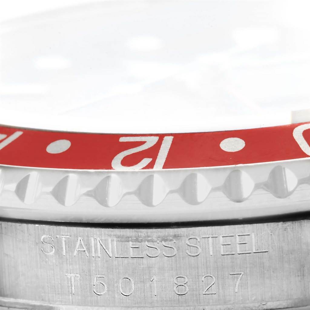 The image shows a close-up of the bezel and part of the stainless steel casing of a Rolex GMT-Master 16710 Men's Stainless Steel Black Dial 16710 Men's Stainless Steel Black Dial watch.