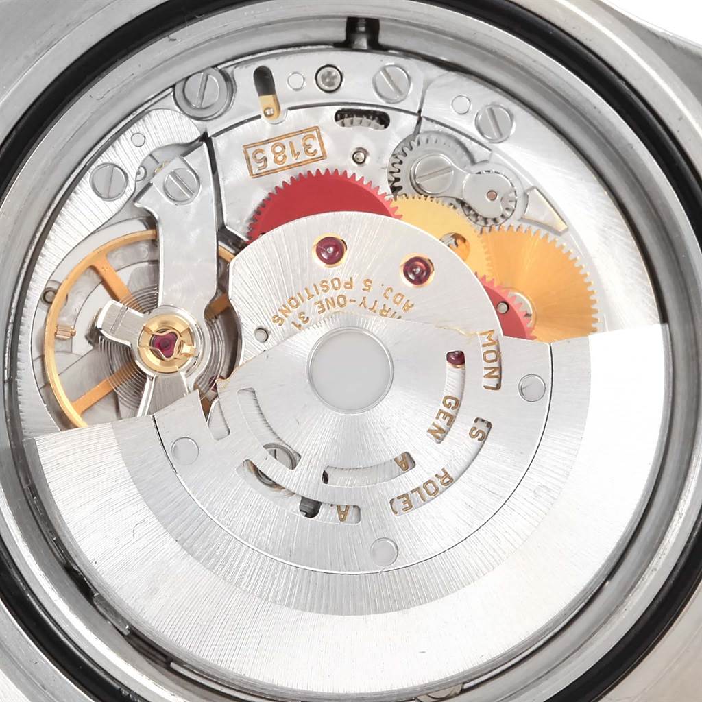 This is a close-up view of the movement mechanism in a Rolex GMT-Master 16710 Men's Stainless Steel Black Dial 16710 Men's Stainless Steel Black Dial watch, showcasing the inner gears and components.