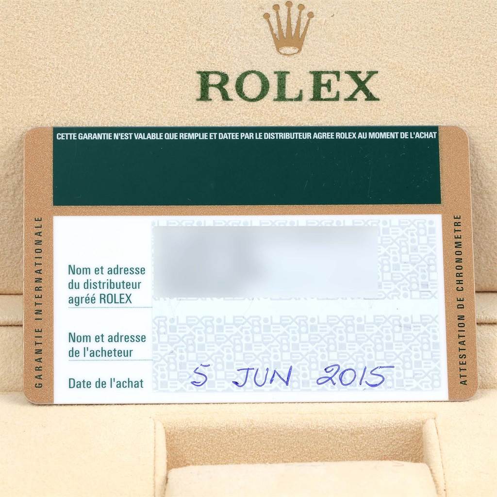 The image shows a close-up of the warranty card for a Rolex GMT-Master 116710 Men's Stainless Steel Black Dial 116710 Men's Stainless Steel Black Dial, placed against a Rolex box background.