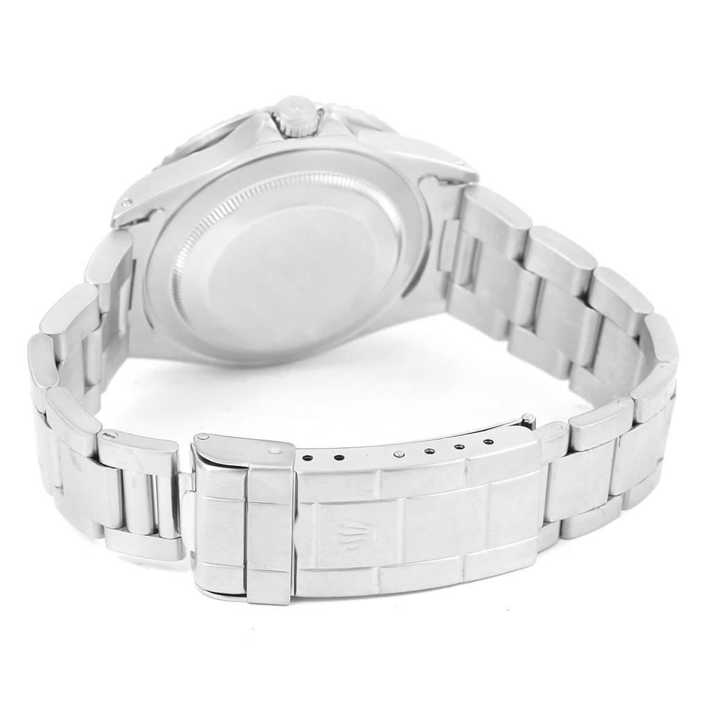 This image shows the back case, crown, and bracelet clasp of a Rolex GMT-Master 16700 Men's Stainless Steel Black Dial 16700 Men's Stainless Steel Black Dial watch from a rear angle.