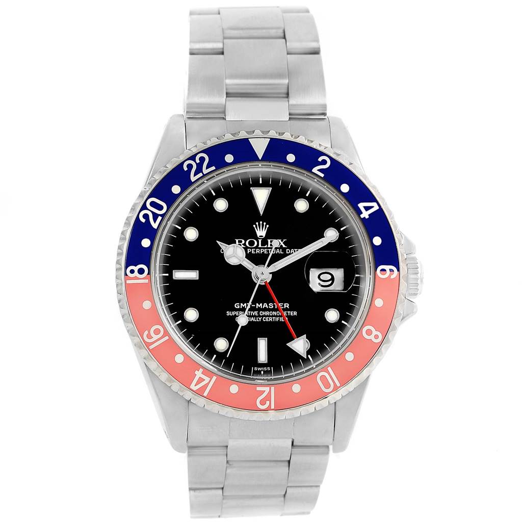 The image shows a front view of a Rolex GMT-Master 16700 Men's Stainless Steel Black Dial 16700 Men's Stainless Steel Black Dial watch featuring a red and blue bezel.