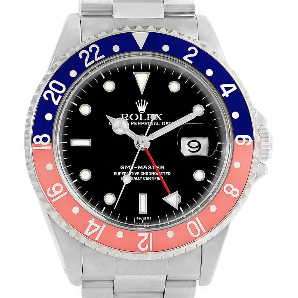 This is a front view of a Rolex GMT-Master 16700 Men's Stainless Steel Black Dial 16700 Men's Stainless Steel Black Dial watch showing its dial, bezel, and part of the bracelet.