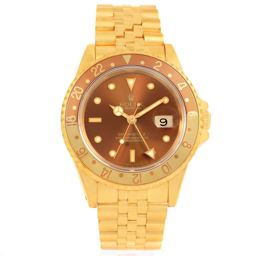 The image shows a front view of a Rolex GMT-Master 16718 Men's Yellow Gold Brown Dial 16718 Men's Yellow Gold Brown Dial watch, highlighting its brown dial, gold casing, and bracelet.