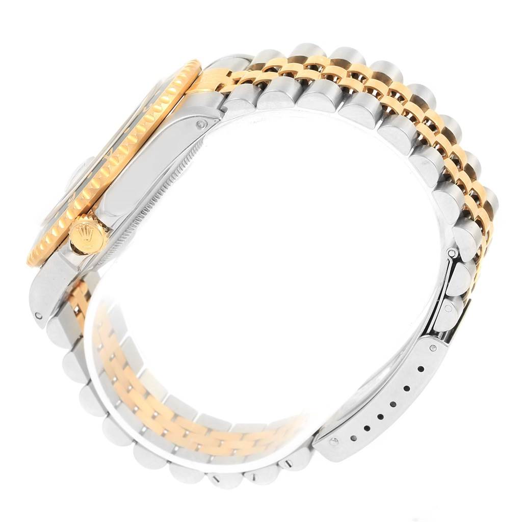 The image shows a side view of the case and jubilee bracelet of a Rolex GMT-Master 16713 Men's Stainless Steel Black Dial 16713 Men's Stainless Steel Black Dial watch in two-tone metal.