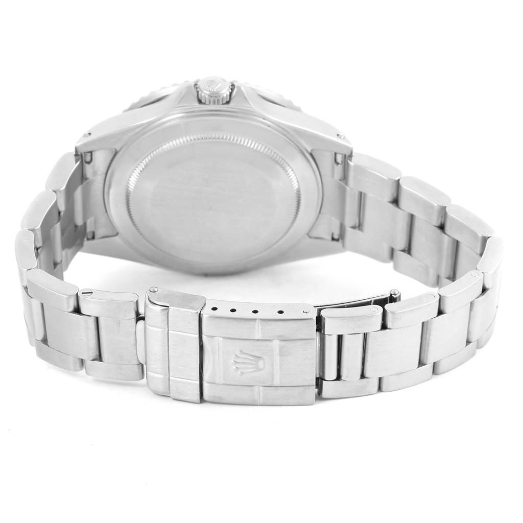 The image shows the back view of a Rolex GMT-Master 16710 Men's Stainless Steel Black Dial 16710 Men's Stainless Steel Black Dial watch, highlighting its case back, crown, and bracelet with clasp.