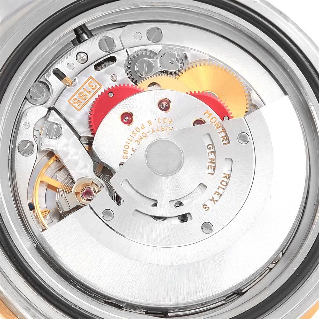 The image shows the internal movement mechanics of a Rolex GMT-Master 16713 Men's Stainless Steel Grey Dial 16713 Men's Stainless Steel Grey Dial watch.