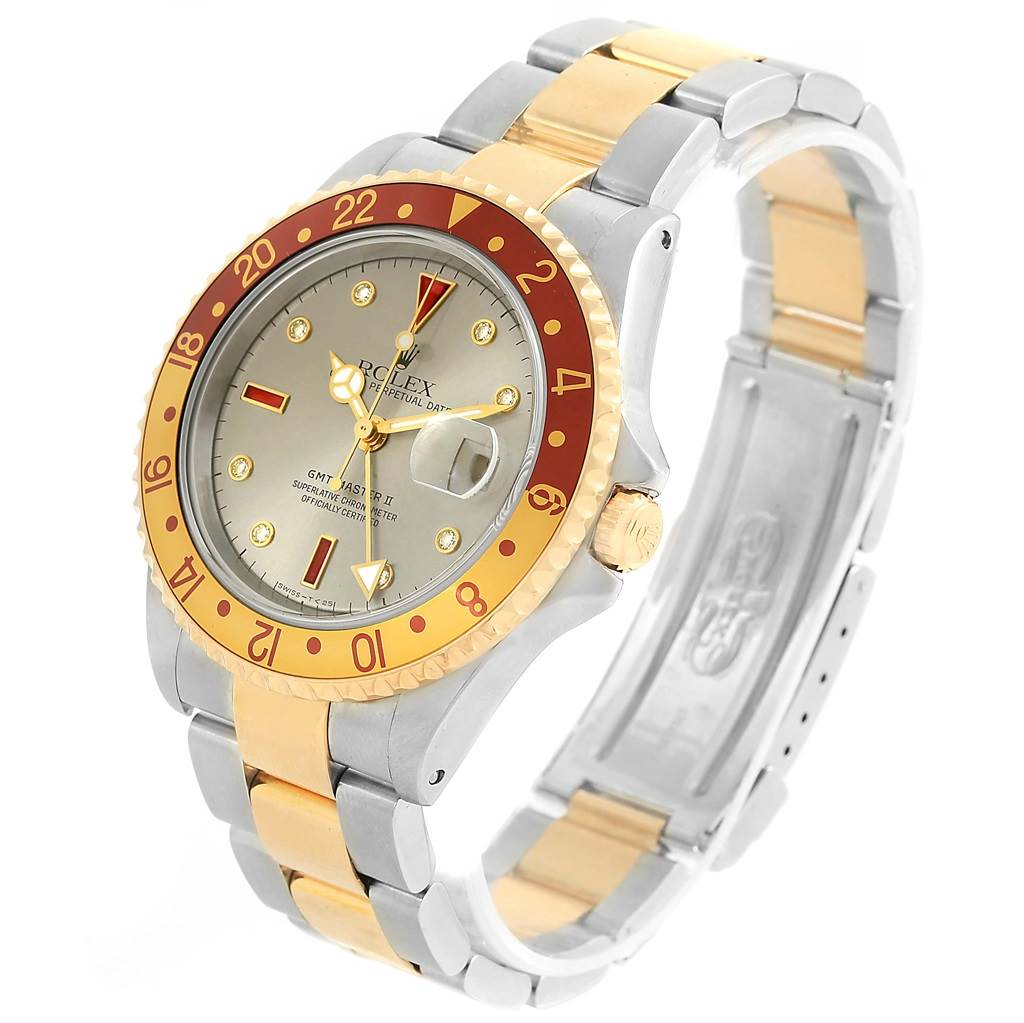 The Rolex GMT-Master 16713 Men's Stainless Steel Grey Dial 16713 Men's Stainless Steel Grey Dial watch is shown at an oblique angle, displaying the bezel, dial, and part of the dual-tone metal bracelet.