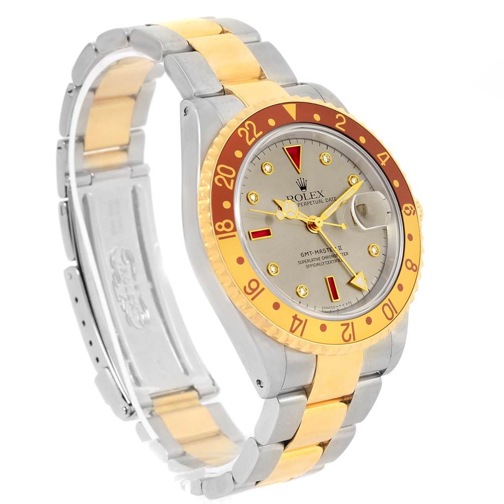 The image shows a Rolex GMT-Master 16713 Men's Stainless Steel Grey Dial 16713 Men's Stainless Steel Grey Dial II watch at a three-quarters angle, highlighting the gold and silver bracelet and bezel.