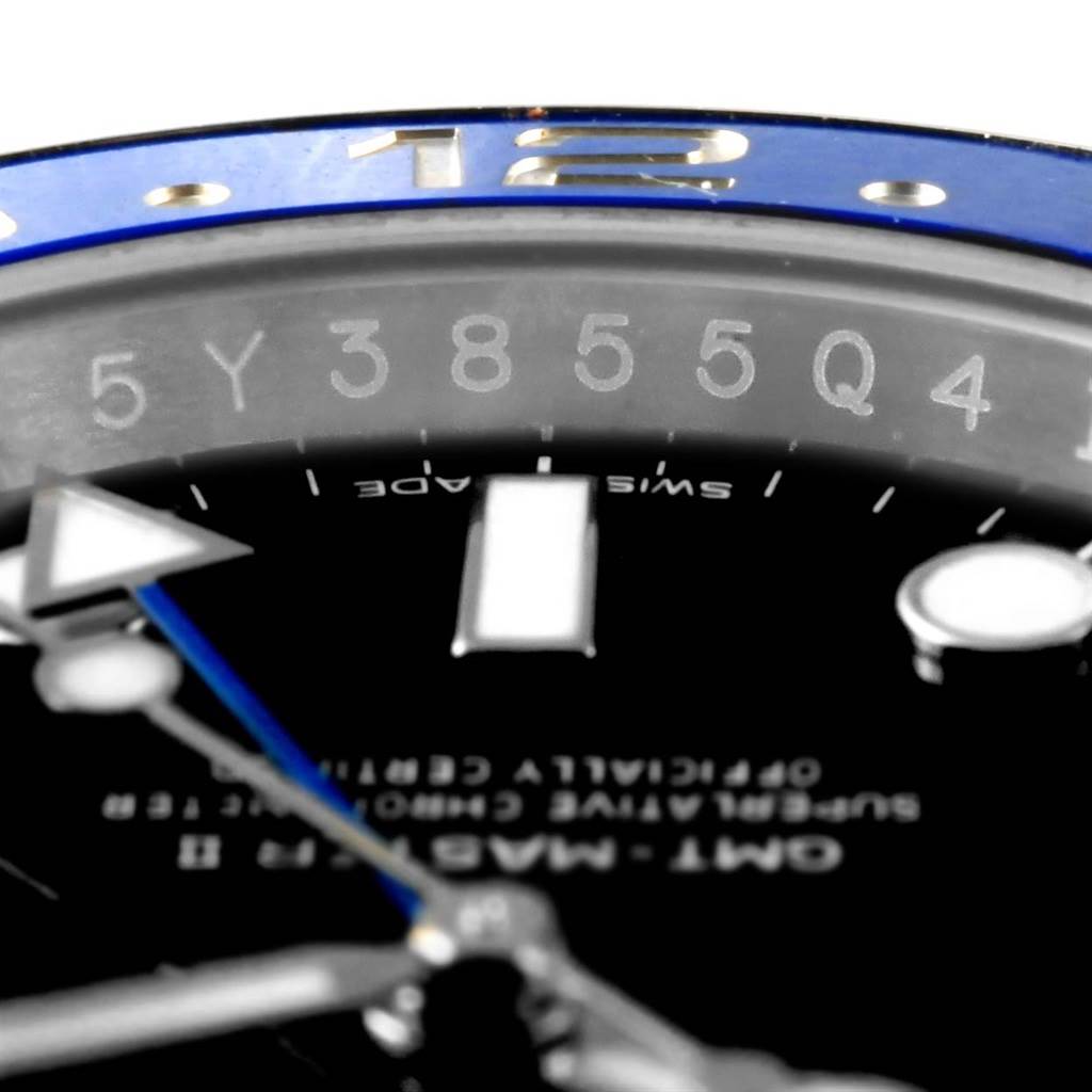 This image shows a close-up of the dial, hands, and part of the bezel of a Rolex GMT-Master 116710 Men's Stainless Steel Black Dial 116710 Men's Stainless Steel Black Dial watch.