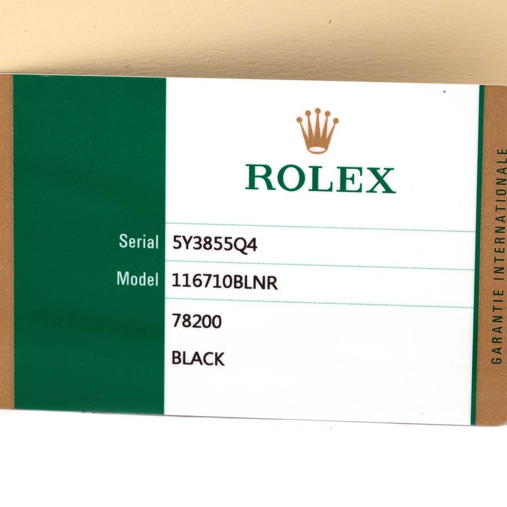 The image shows a close-up of a Rolex authenticity card for the GMT-Master model 116710BLNR, with details like the serial number and color.