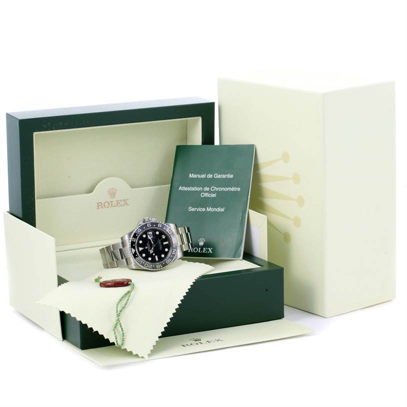 The image shows a Rolex GMT-Master 116710 Men's Stainless Steel Black Dial 116710 Men's Stainless Steel Black Dial watch at a front angle, inside its box along with the manual and cleaning accessories.