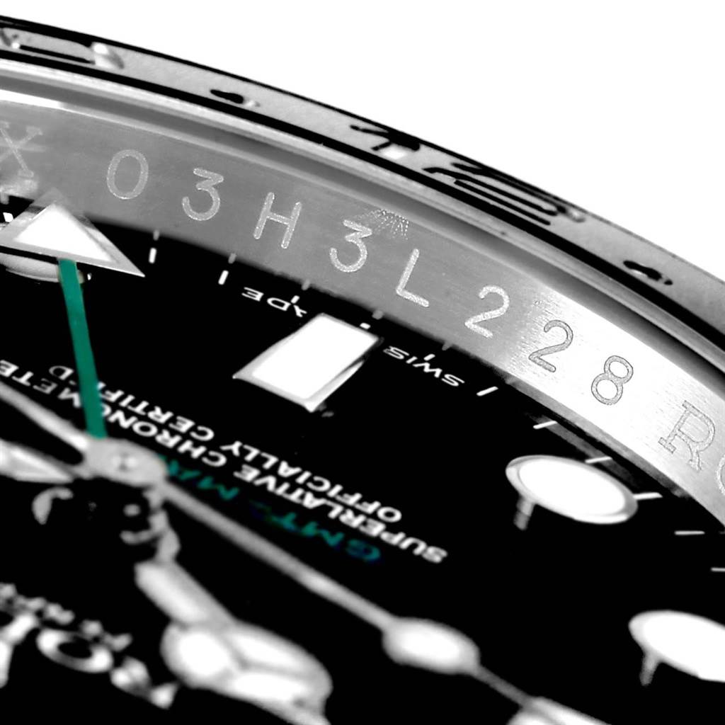 Close-up angle of the Rolex GMT-Master 116710 Men's Stainless Steel Black Dial 116710 Men's Stainless Steel Black Dial watch showing the edge of the dial, bezel, and part of the hands.