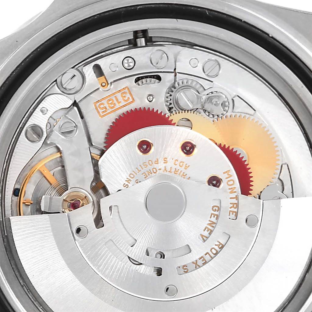 This image shows an internal view of the Rolex GMT-Master 16710 Men's Stainless Steel Black Dial 16710 Men's Stainless Steel Black Dial watch, focusing on the movement mechanism and gears.