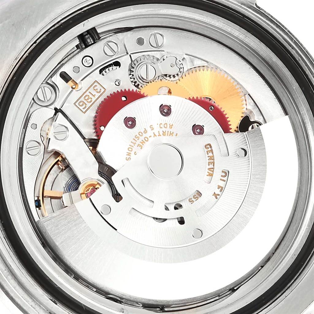 This image shows the internal movement mechanism of a Rolex GMT-Master 116710 Men
s Stainless Steel Black Dial 116710 Men
s Stainless Steel Black Dial watch from a top-down angle.