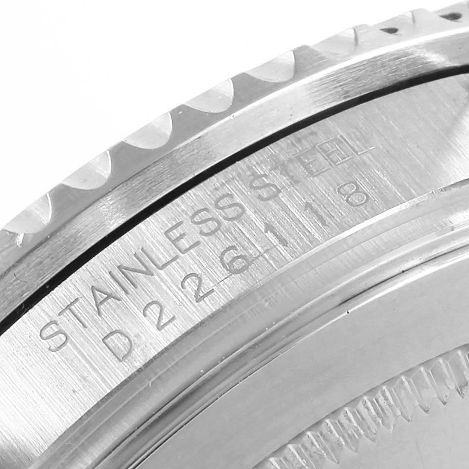 This image shows a close-up of the case back edge and part of the bezel of a Rolex GMT-Master 16710 Men
s Stainless Steel Black Dial 16710 Men
s Stainless Steel Black Dial, highlighting the stainless steel engraving.