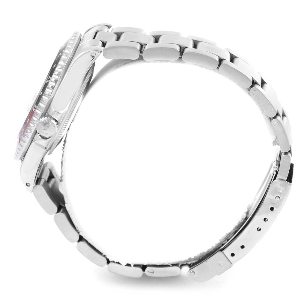 The image shows a side view of a Rolex GMT-Master 16700 Men's Stainless Steel Black Dial 16700 Men's Stainless Steel Black Dial watch, highlighting the bracelet, bezel, crown, and clasp.