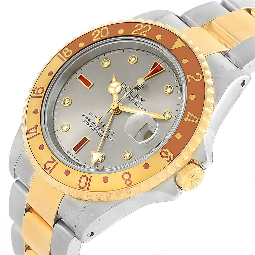 This image shows a close-up angle of the face and part of the bracelet of a Rolex GMT-Master 16713 Men's Stainless Steel Grey Dial 16713 Men's Stainless Steel Grey Dial watch.