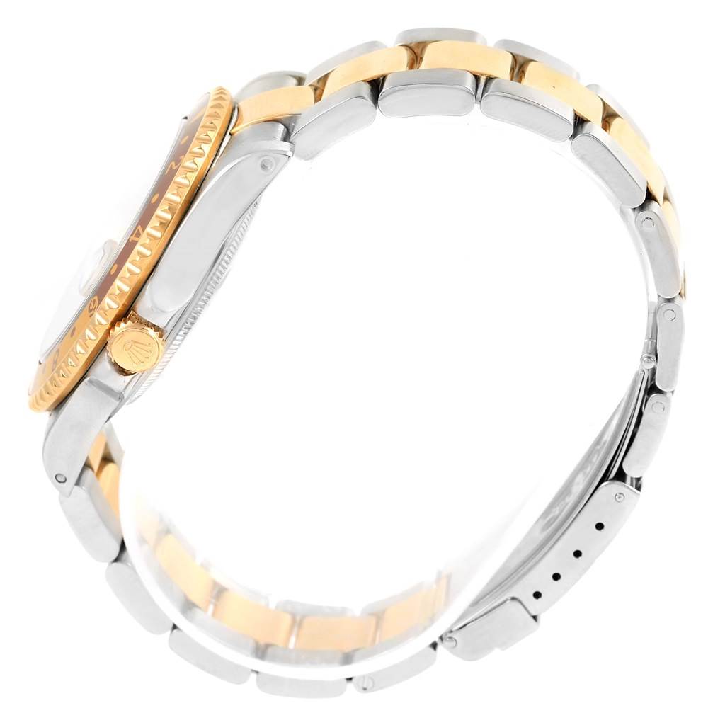 The image shows the side profile of a Rolex GMT-Master 16713 Men's Stainless Steel Grey Dial 16713 Men's Stainless Steel Grey Dial watch, highlighting the crown, case, and two-tone bracelet.