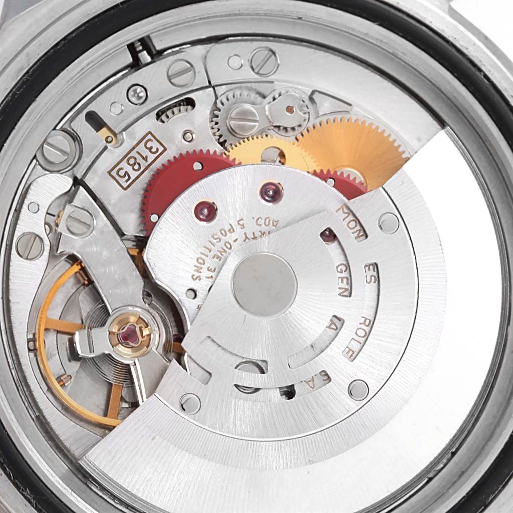 This image shows the intricate inner workings and mechanism of a Rolex GMT-Master 16713 Men's Stainless Steel Grey Dial 16713 Men's Stainless Steel Grey Dial watch from a close-up, rear angle.