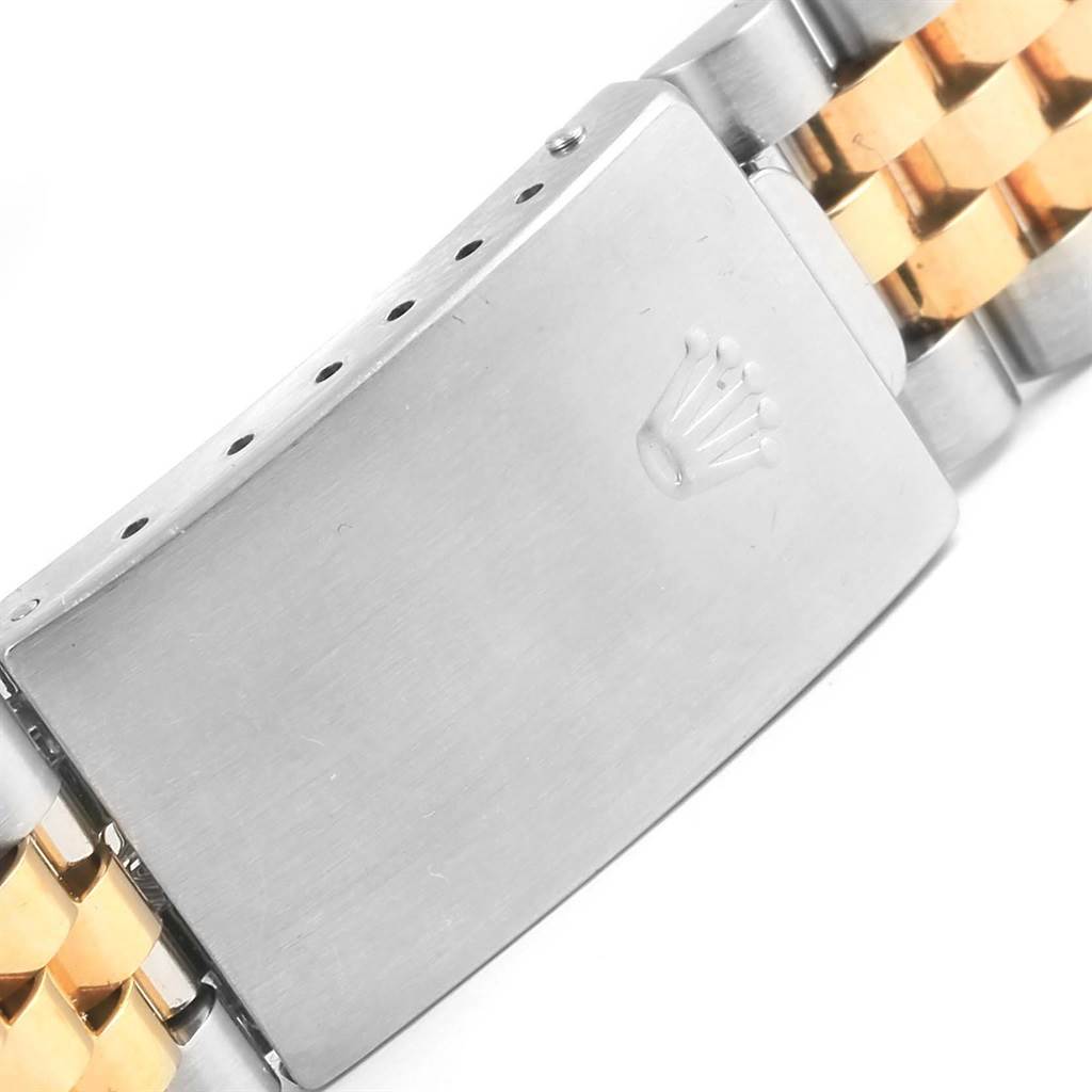 This image shows the clasp of a Rolex GMT-Master 16713 Men's Stainless Steel Black Dial 16713 Men's Stainless Steel Black Dial watch with a two-tone bracelet.