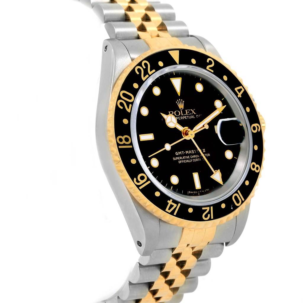 The image shows the front angle of the Rolex GMT-Master 16713 Men's Stainless Steel Black Dial 16713 Men's Stainless Steel Black Dial watch, highlighting the bezel, dial, hands, and two-tone bracelet.