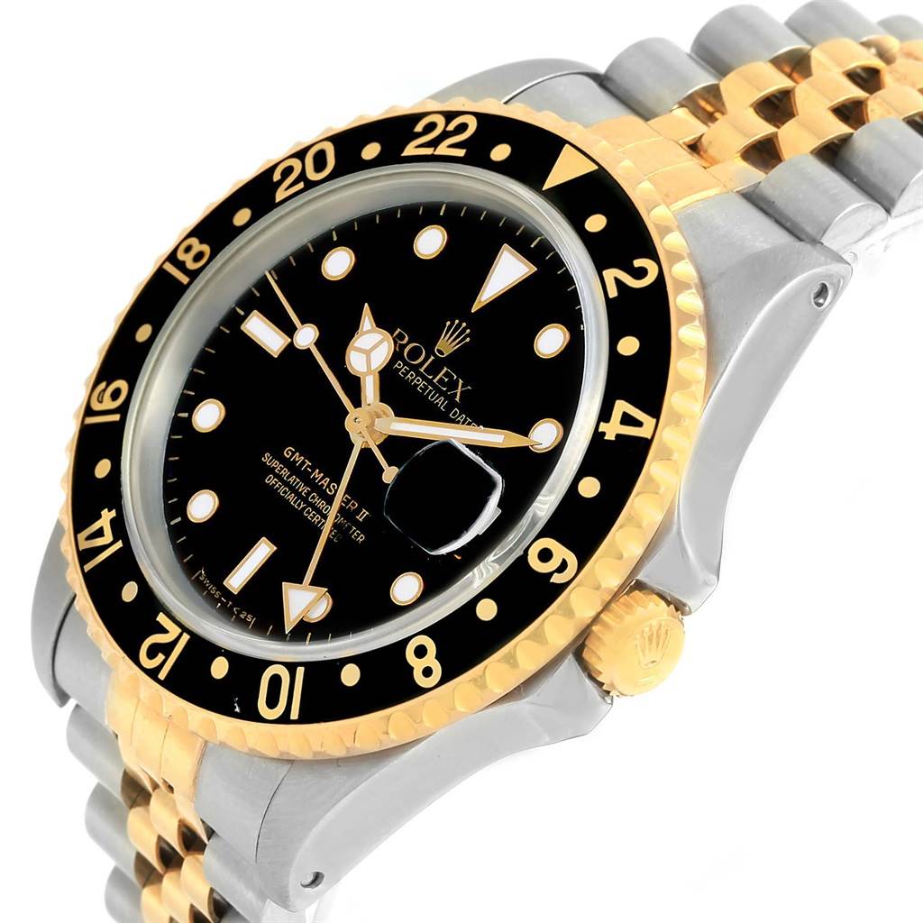 The image shows a close-up view of the dial, bezel, and part of the bracelet of the Rolex GMT-Master 16713 Men's Stainless Steel Black Dial 16713 Men's Stainless Steel Black Dial watch.