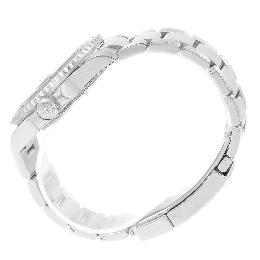 The image shows a side view of a Rolex GMT-Master 116710 Men
s Stainless Steel Black Dial 116710 Men
s Stainless Steel Black Dial watch, focusing on the case, bezel, crown, and bracelet.