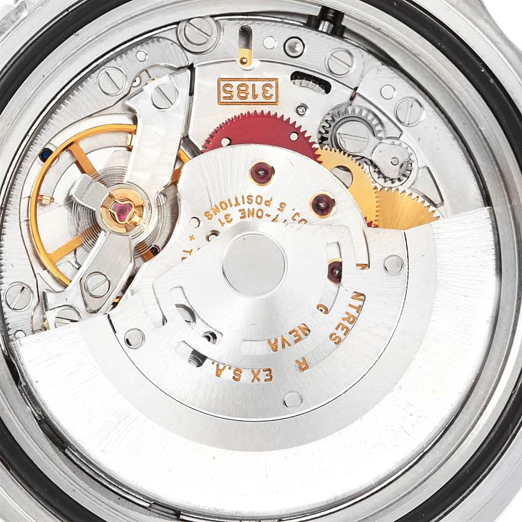This image shows a close-up of the movement mechanism of the Rolex GMT-Master 16710 Men's Stainless Steel Black Dial 16710 Men's Stainless Steel Black Dial watch.
