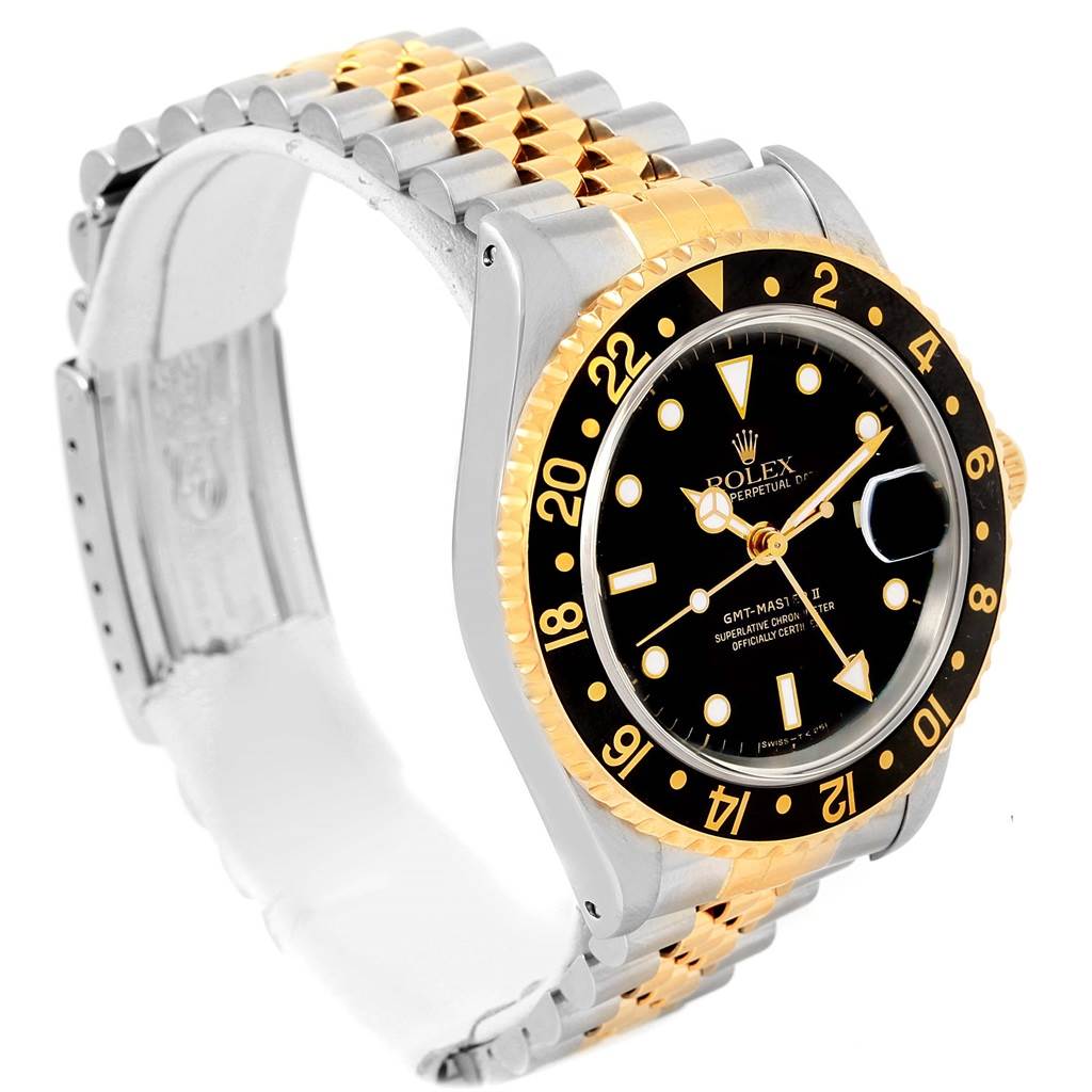 The image shows a Rolex GMT-Master 16713 Men's Stainless Steel Black Dial 16713 Men's Stainless Steel Black Dial watch viewed from an angled side profile, highlighting the bezel, dial, and bracelet.
