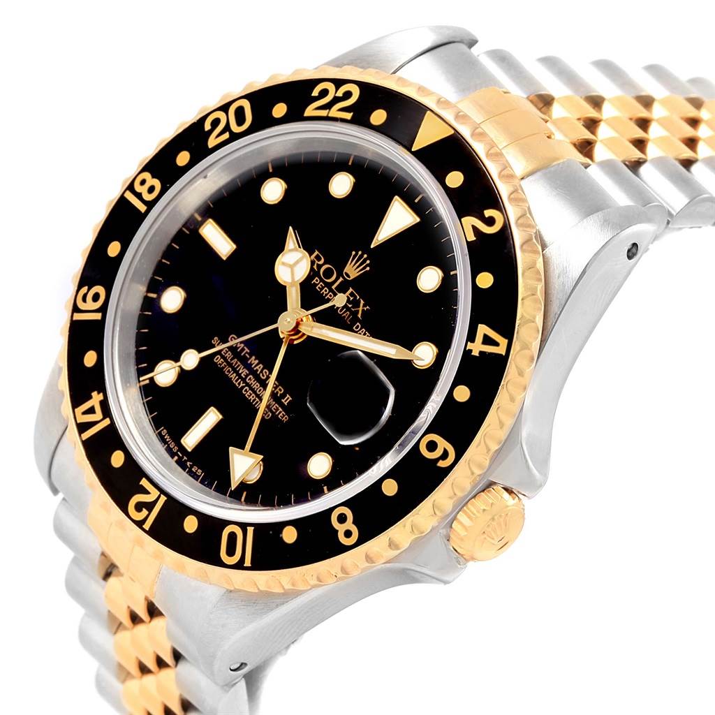 This image shows a close-up angle of the Rolex GMT-Master 16713 Men's Stainless Steel Black Dial 16713 Men's Stainless Steel Black Dial watch, highlighting its bezel, dial, crown, and partial bracelet.