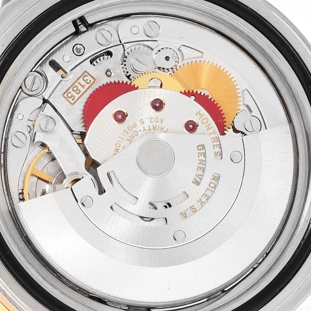 The image shows the intricate inner movement of the Rolex GMT-Master 16713 Men's Stainless Steel Black Dial 16713 Men's Stainless Steel Black Dial watch viewed from the back.