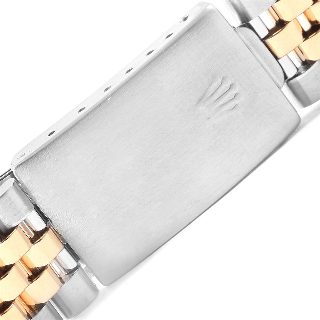 The image shows the clasp of a Rolex GMT-Master 16713 Men's Stainless Steel Black Dial 16713 Men's Stainless Steel Black Dial watch, featuring a two-tone metal bracelet.