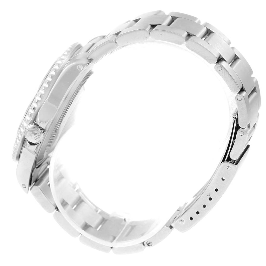 The image shows a side profile of a Rolex GMT-Master 16700 Men
s Stainless Steel Black Dial 16700 Men
s Stainless Steel Black Dial watch, focusing on the bracelet and case.