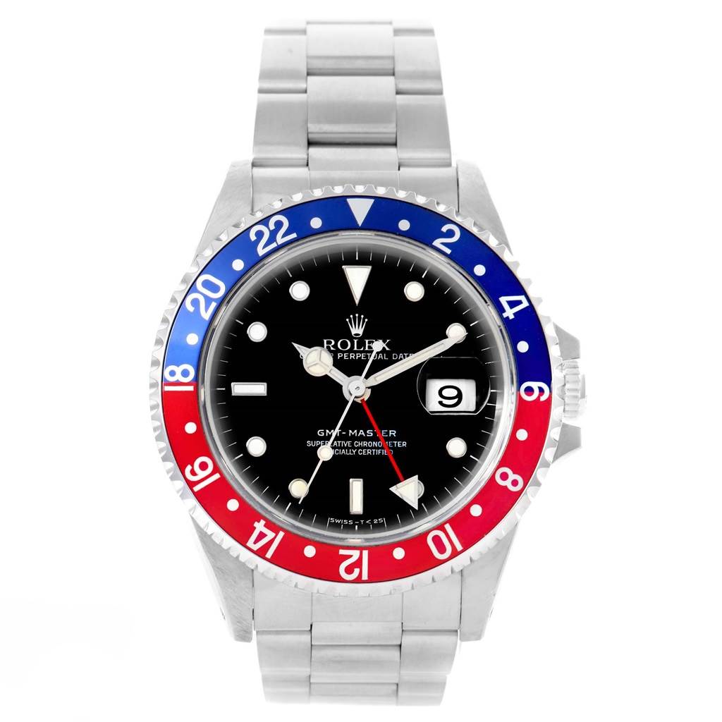 This image shows the front view of a Rolex GMT-Master 16700 Men
s Stainless Steel Black Dial 16700 Men
s Stainless Steel Black Dial watch, featuring a red and blue bezel, black dial, and stainless steel bracelet.