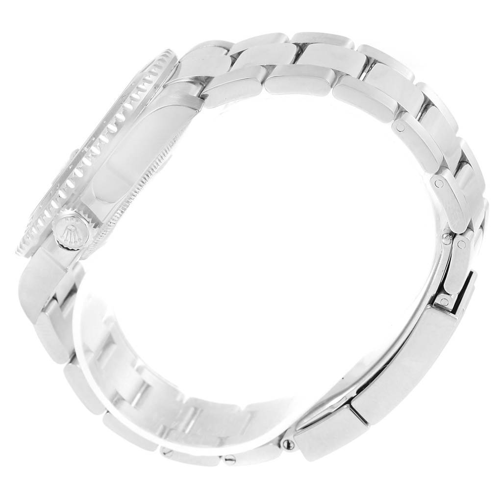 The image shows a side view of a Rolex GMT-Master 116710 Men's Stainless Steel Black Dial 116710 Men's Stainless Steel Black Dial watch focusing on the case, crown, and metal bracelet.