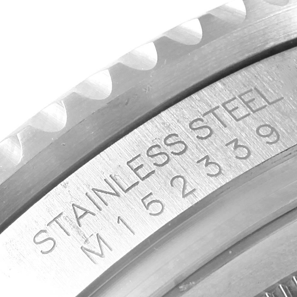 The image shows a close-up of the engraved stainless steel casing on a Rolex GMT-Master 116710 Men's Stainless Steel Black Dial 116710 Men's Stainless Steel Black Dial watch.