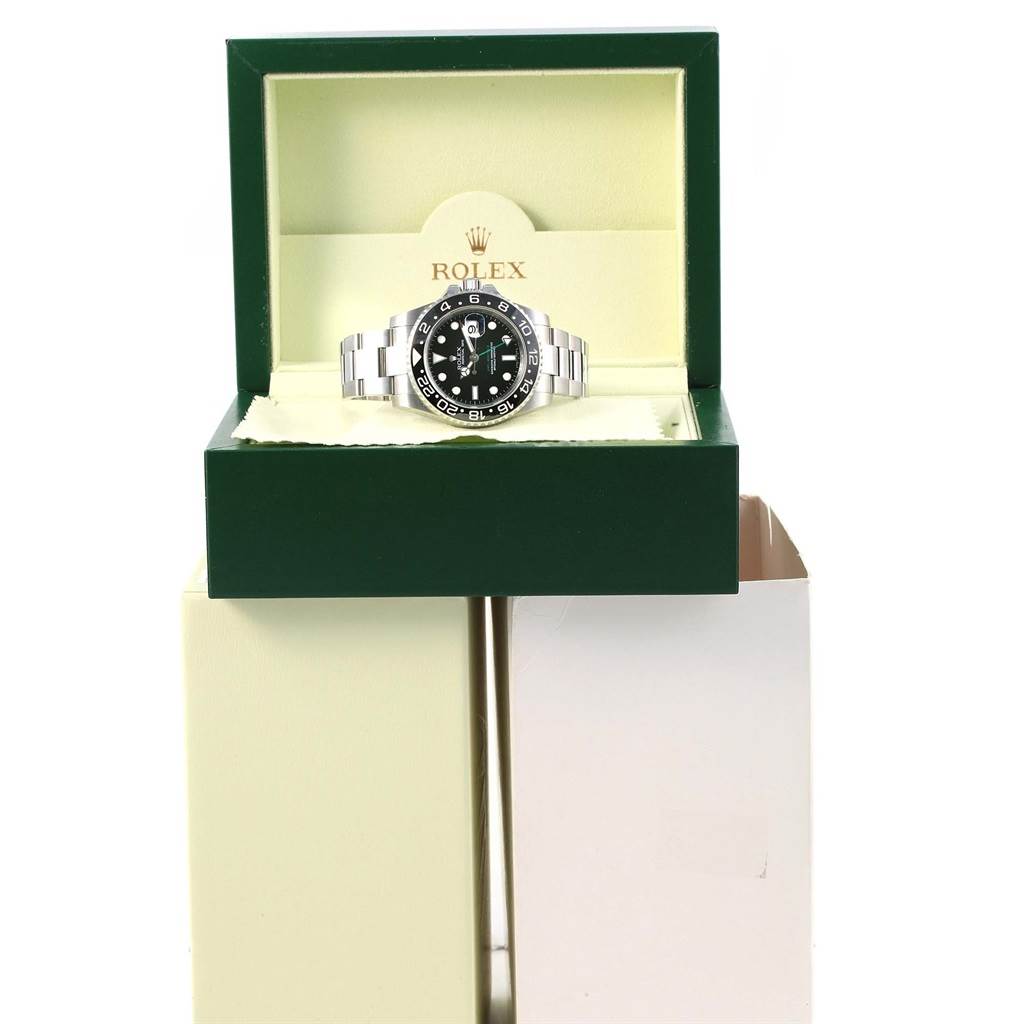 The Rolex GMT-Master 116710 Men's Stainless Steel Black Dial 116710 Men's Stainless Steel Black Dial watch is displayed in its open box at a straight-on angle, showcasing the bezel, dial, and bracelet.
