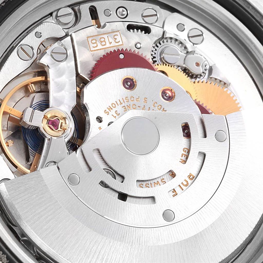 This image shows a close-up of the movement and inner mechanical parts of a Rolex GMT-Master 116710 Men's Stainless Steel Black Dial 116710 Men's Stainless Steel Black Dial watch.