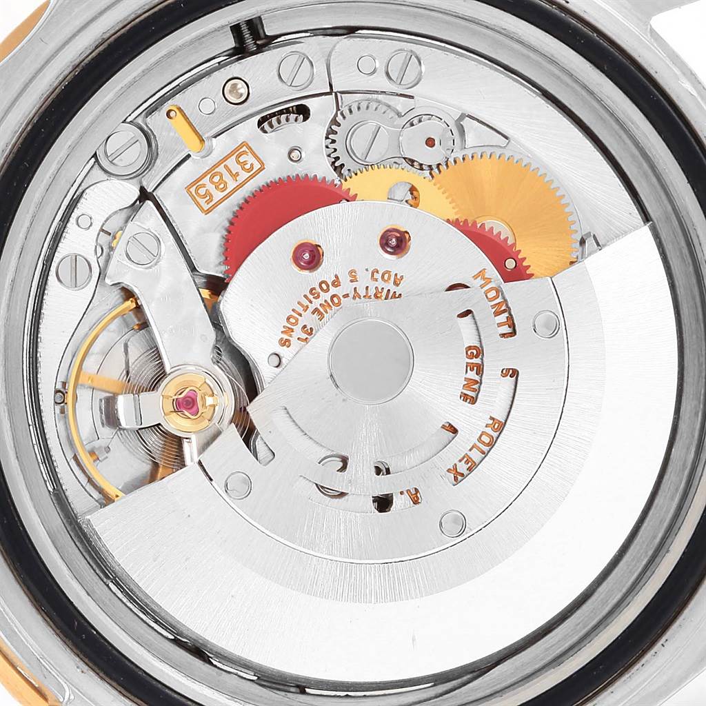 This image shows the movement and inner mechanical parts of the Rolex GMT-Master 16713 Men
s Stainless Steel Black Dial 16713 Men
s Stainless Steel Black Dial watch from a close-up angle.