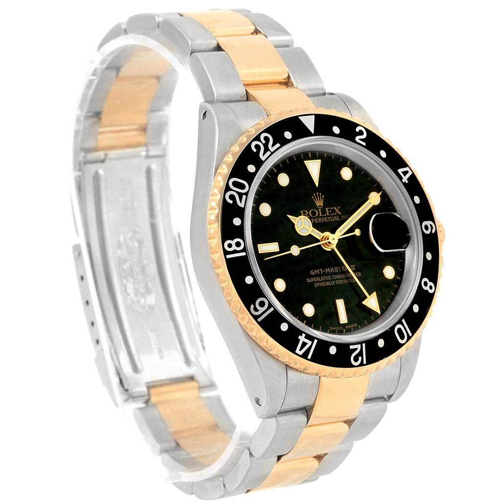 The image shows a Rolex GMT-Master 16713 Men's Stainless Steel Black Dial 16713 Men's Stainless Steel Black Dial watch at a three-quarter angle, highlighting its face, bezel, and two-tone bracelet.
