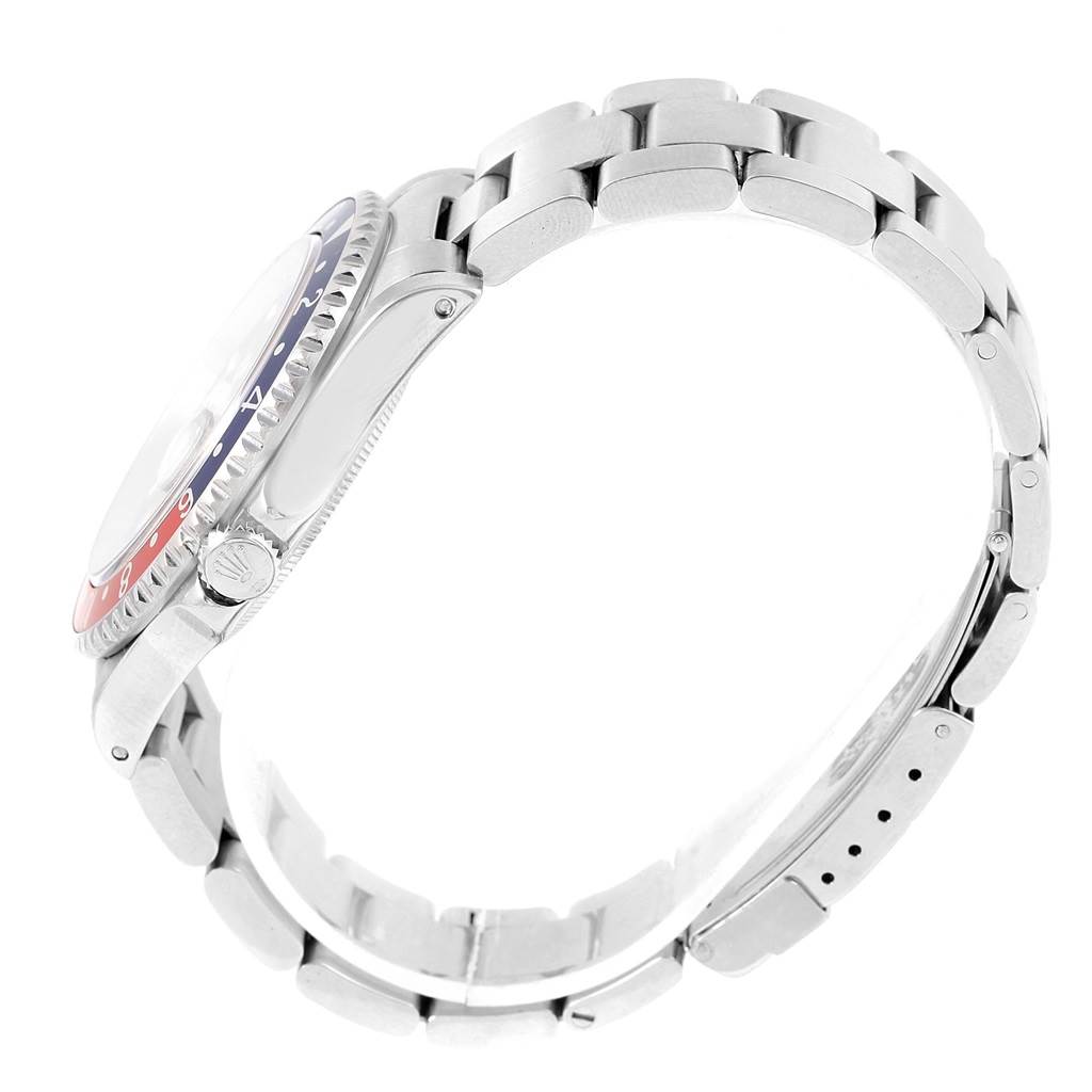 The image shows a side view of the Rolex GMT-Master 16700 Men's Stainless Steel Black Dial 16700 Men's Stainless Steel Black Dial watch, highlighting its bezel, crown, and bracelet.