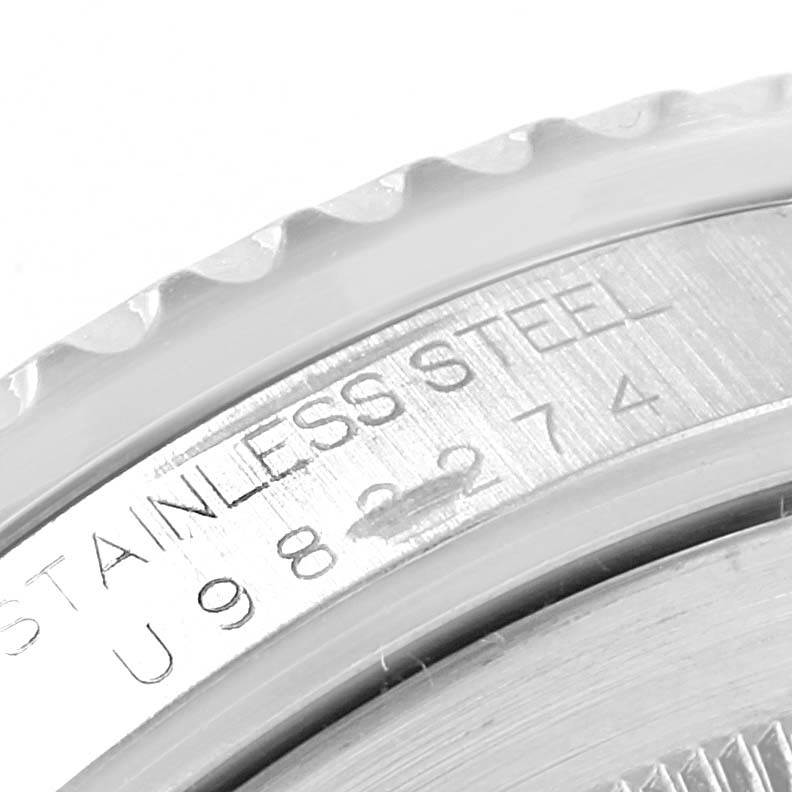 The image shows a close-up of the case back and serial number engraving on a Rolex GMT-Master 16700 Men's Stainless Steel Black Dial 16700 Men's Stainless Steel Black Dial watch.