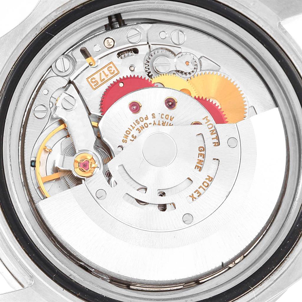 This image shows the internal mechanism of a Rolex GMT-Master 16700 Men's Stainless Steel Black Dial 16700 Men's Stainless Steel Black Dial watch, highlighting gears, jewels, and the rotor from the back.