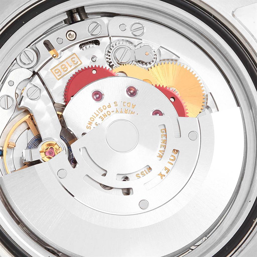 The image shows the internal mechanism of the Rolex GMT-Master 116710 Men's Stainless Steel Black Dial 116710 Men's Stainless Steel Black Dial watch, featuring gears and the rotor.