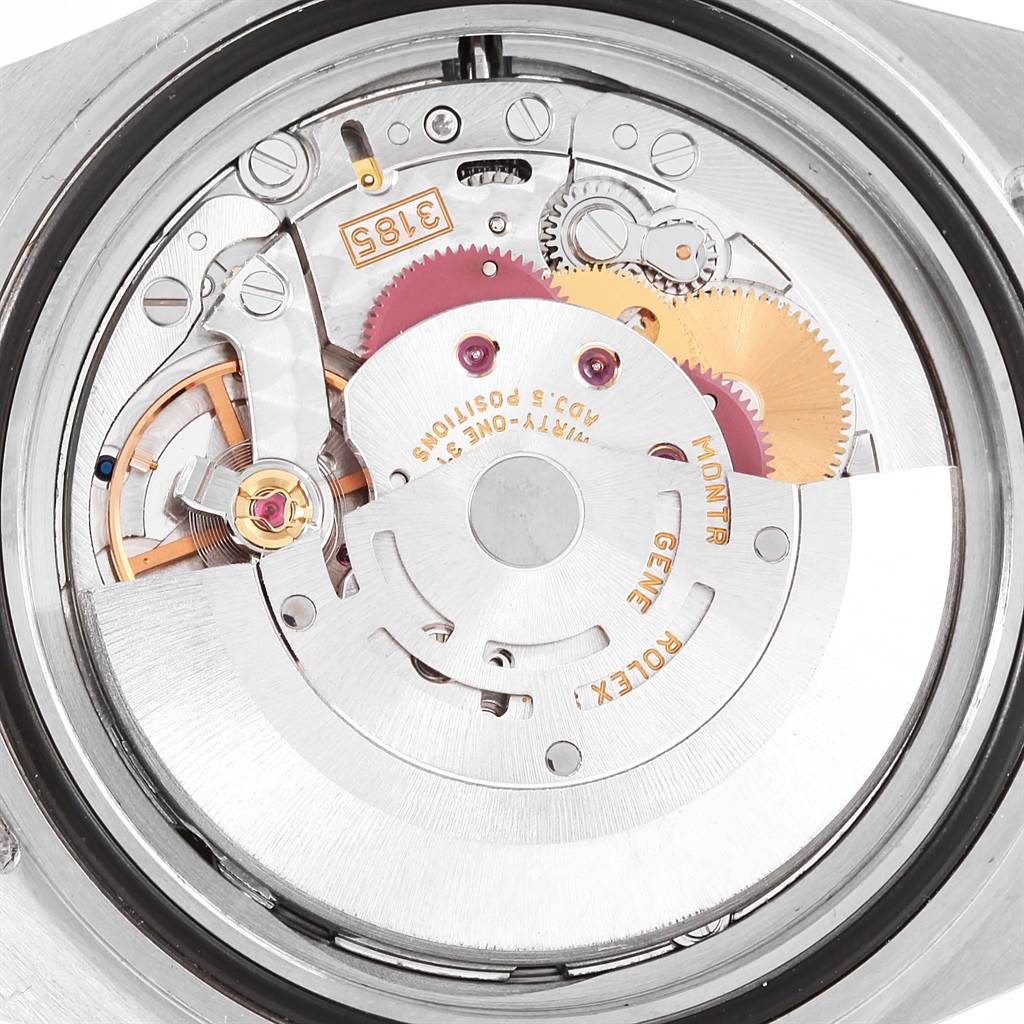 This image shows the internal mechanism and movement of a Rolex GMT-Master 16710 Men
s Stainless Steel Black Dial 16710 Men
s Stainless Steel Black Dial watch.