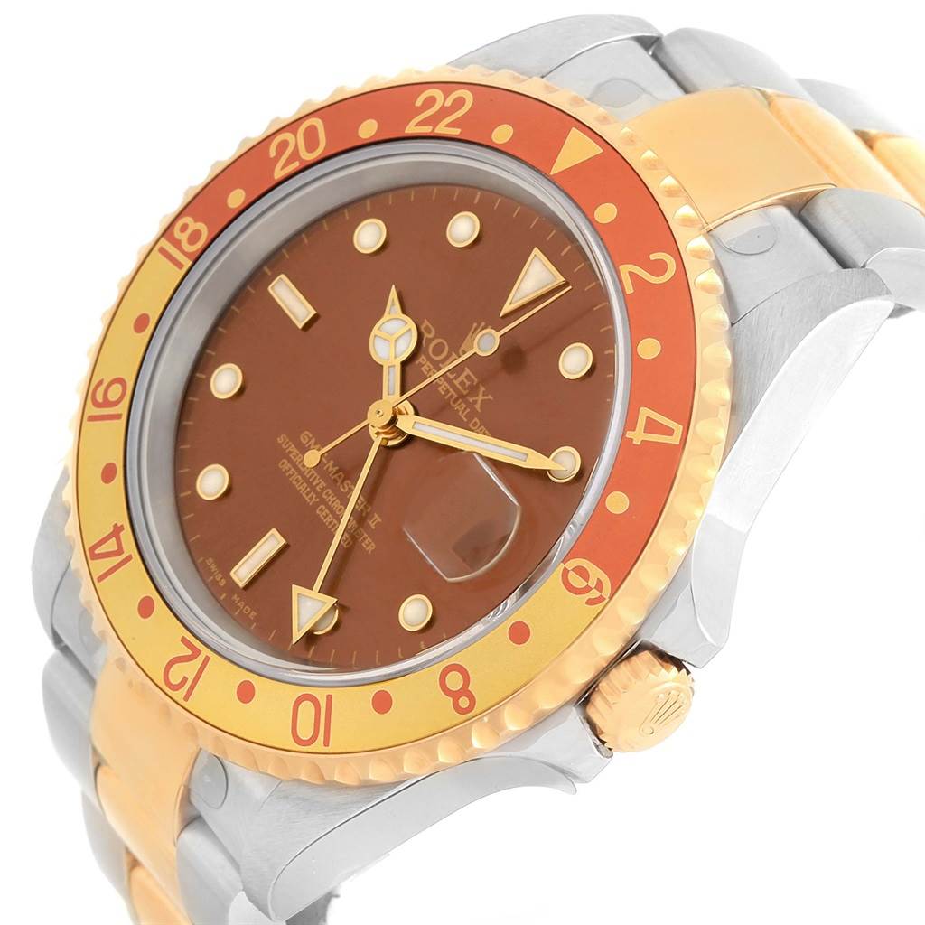 This image shows a Rolex GMT-Master 16713 Men's Stainless Steel Brown Dial 16713 Men's Stainless Steel Brown Dial watch at an angled top view, highlighting the bezel, dial, and crown.