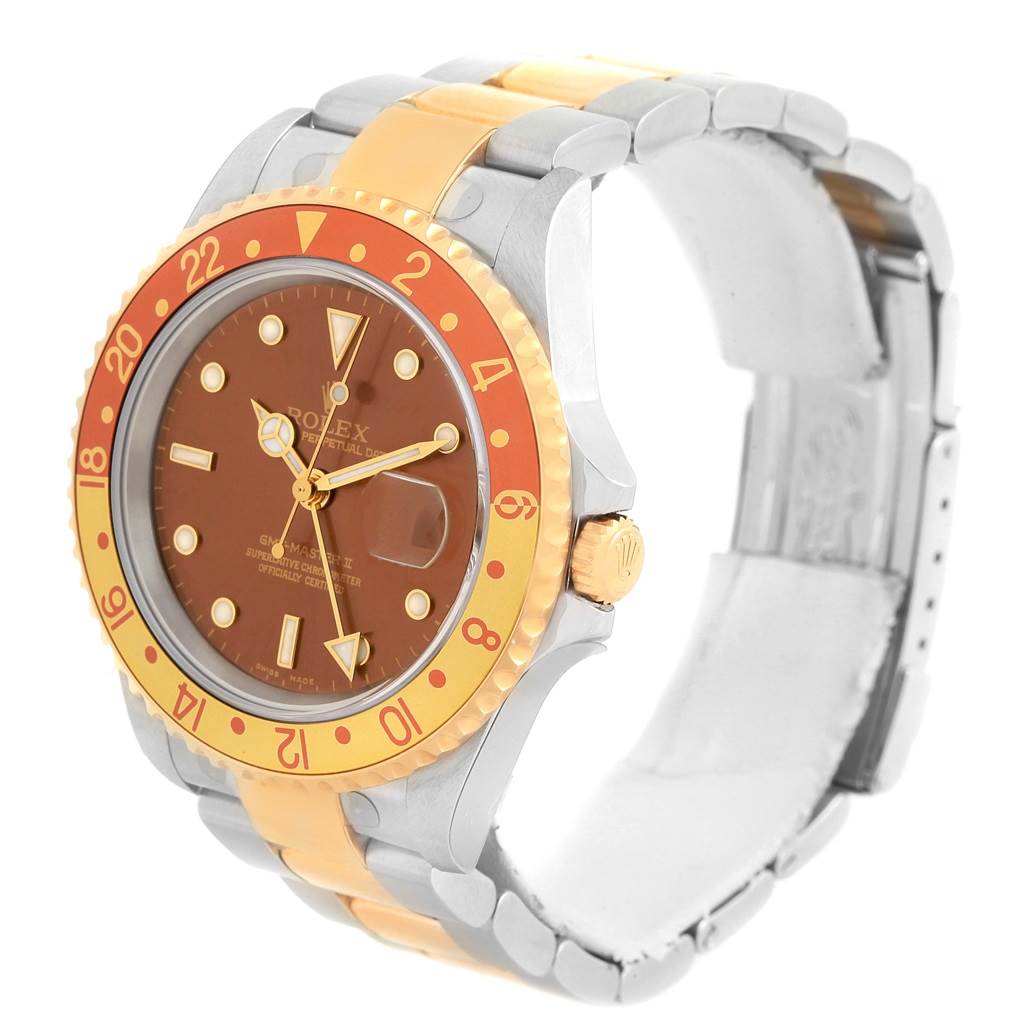 This is a side angle view of a Rolex GMT-Master 16713 Men's Stainless Steel Brown Dial 16713 Men's Stainless Steel Brown Dial watch, highlighting the bezel, dial, and two-tone bracelet.